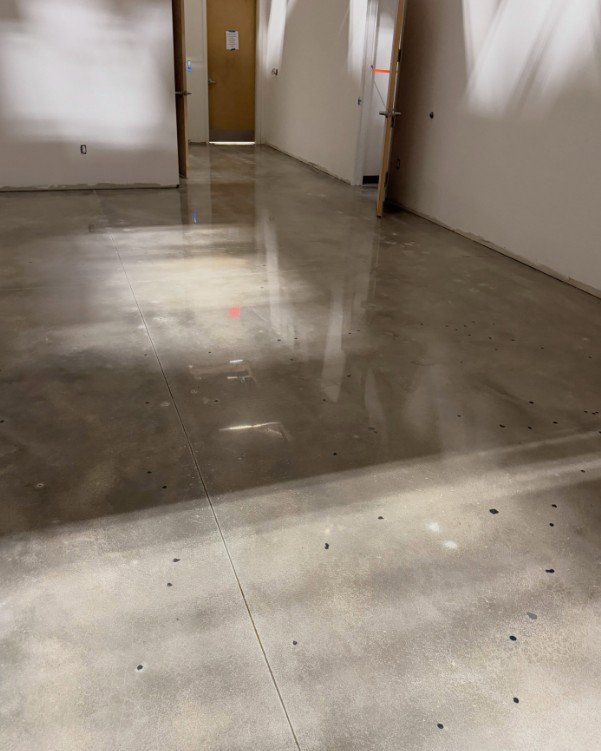 Smooth concrete floor resurfaced for a property in Plattsburgh, New York