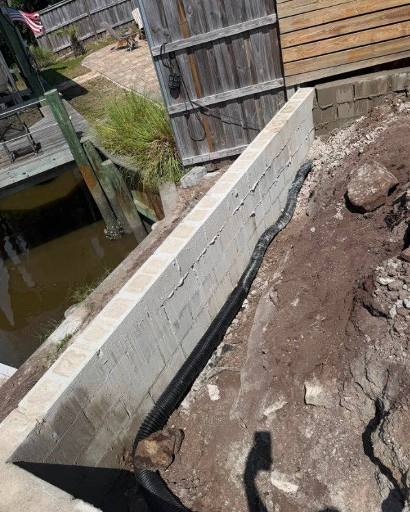 Concrete retaining wall installation for a property in Plattsburgh, New York