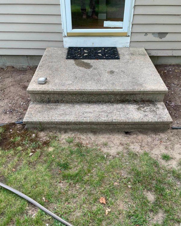 Freshly poured concrete steps for a residence in Plattsburgh, New York
